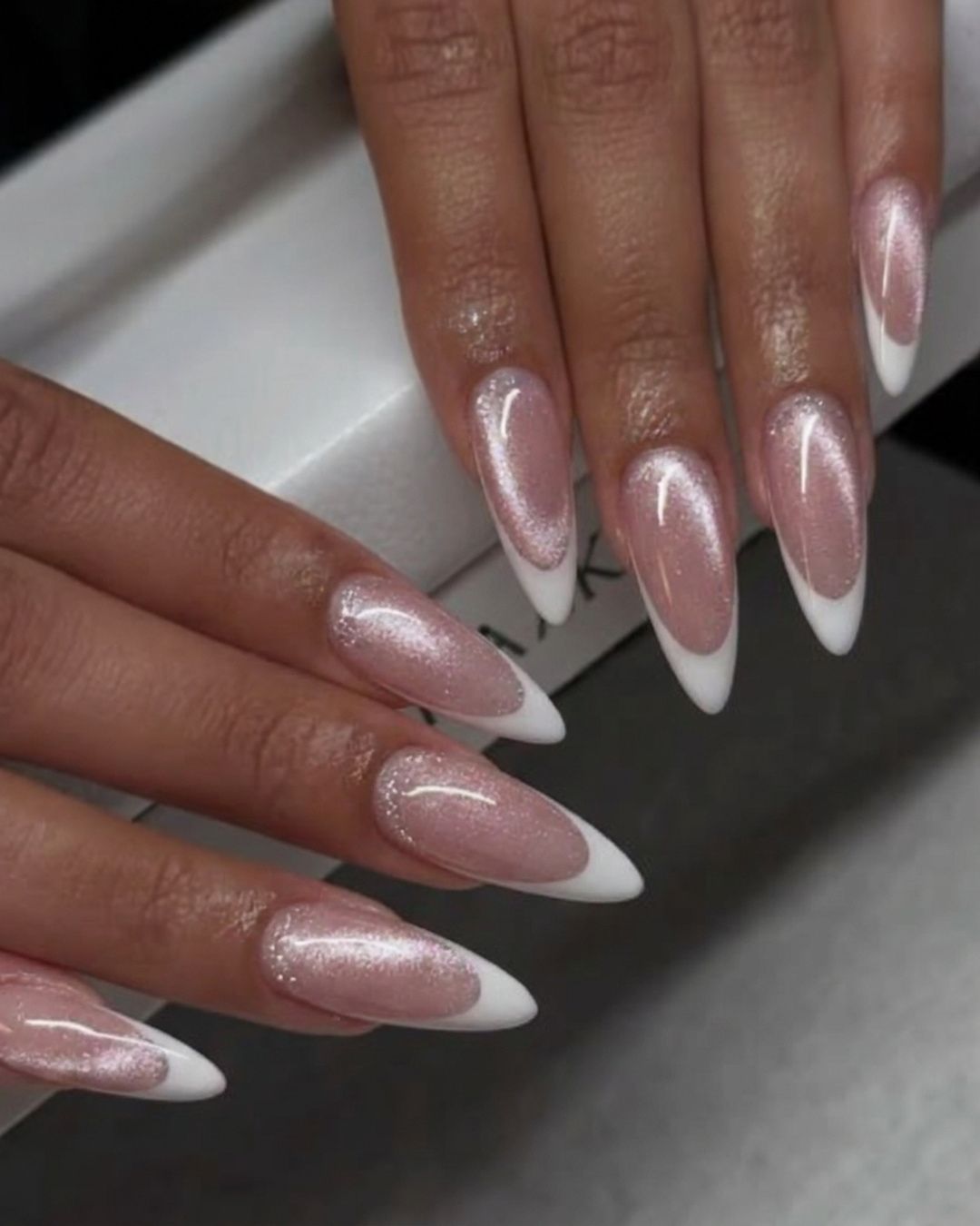 Chrome pink French manicure in Red Deer, AB